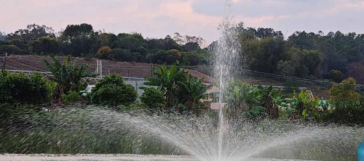 The spray pattern of the Goldlife N2 nozzle over a lake